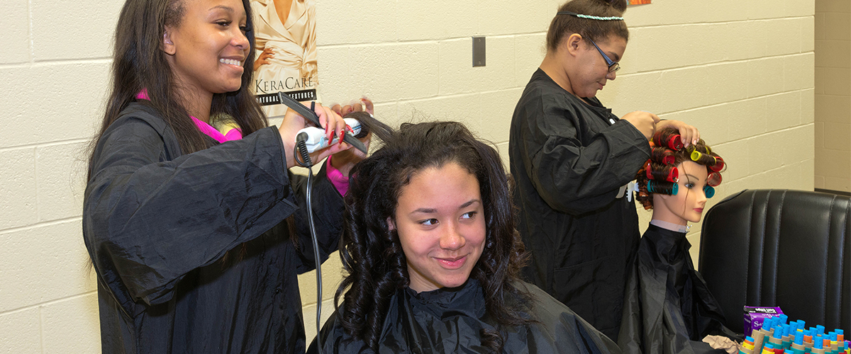 Students training in Cosmetology class